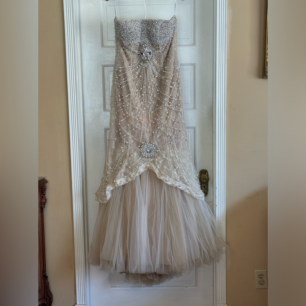 Beautiful pearl and rhinestone mermaid styled evening gown.